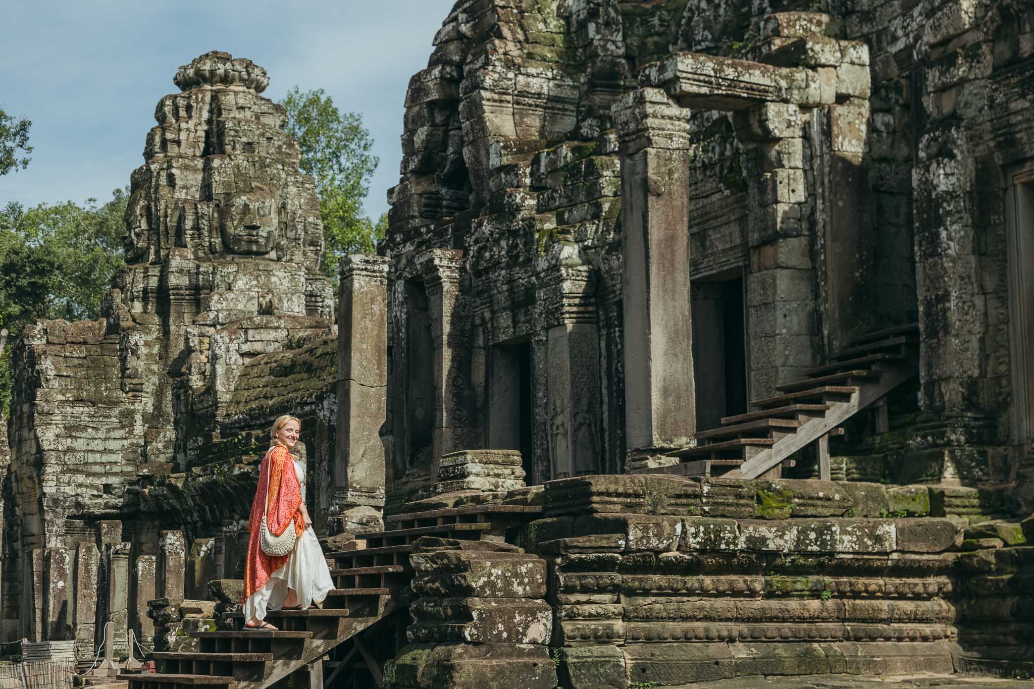 Traveler at bayon temple, Angkor. Photograph by Angkor Wat Photographer