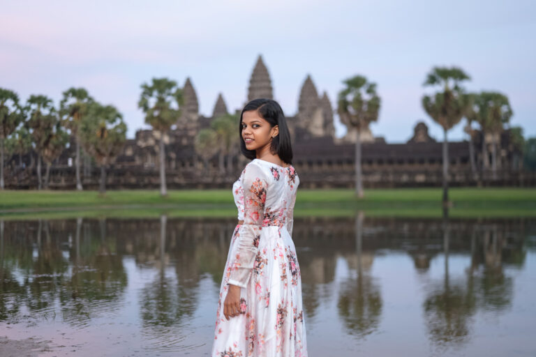 lady at the reflecting lotus pond on an angkor wat photographer photoshoot