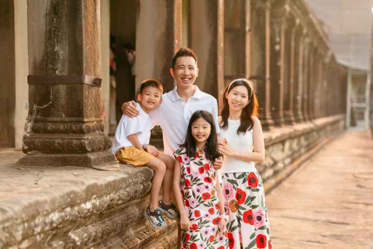 Family photography session at Angkor Wat during golden hour