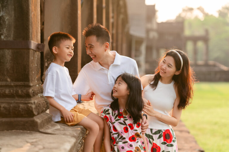 Family portrait at Angkor Wat temple in Siem Reap, Cambodia