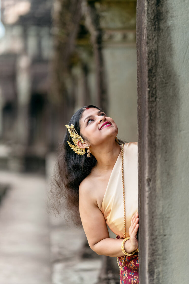 women wearing traditional Cambodian jewelery and outfit at Angkor wat